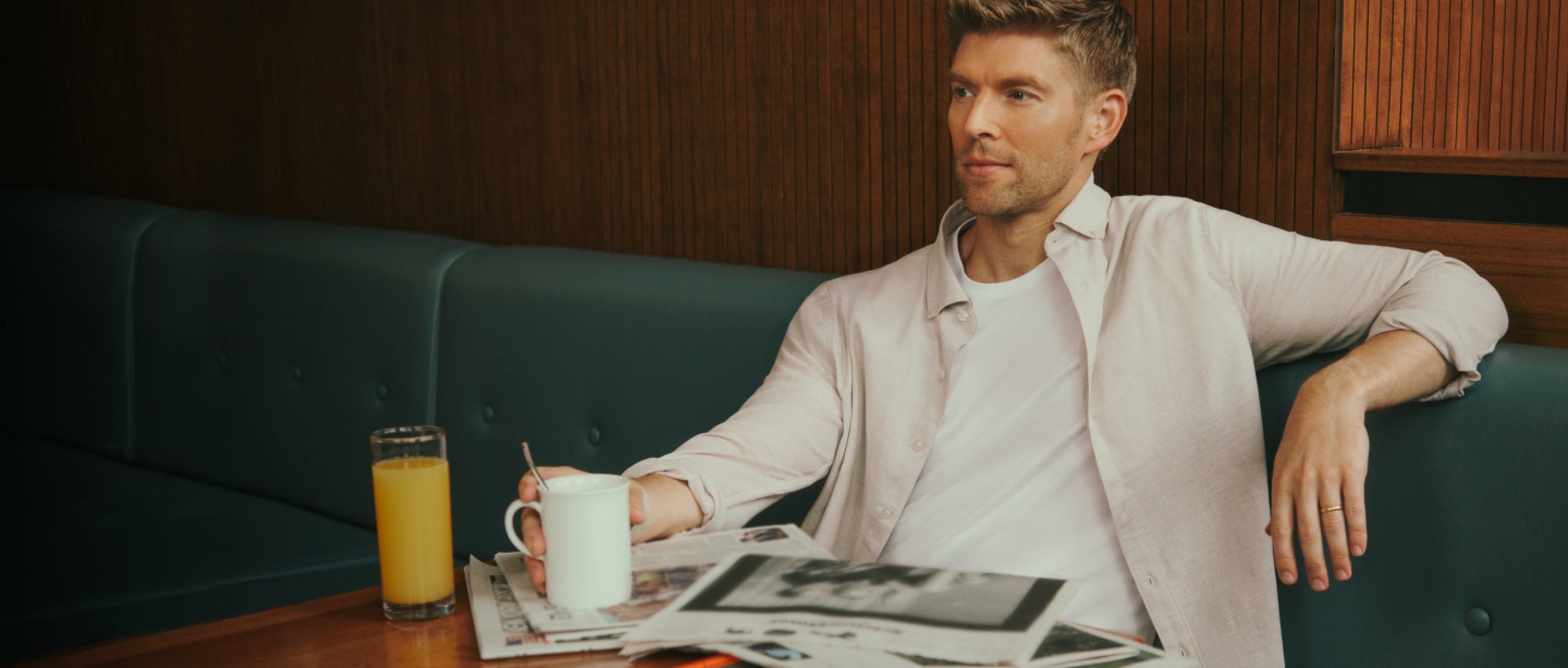 Featuring Kyle Cooke wearing Tech Linen Button Up