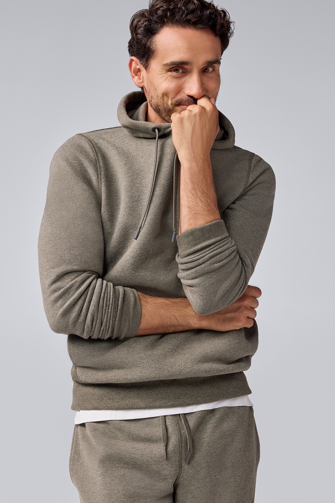 Man wearing Ace Pullout Hoodie Sweatshirt in Sage Heather