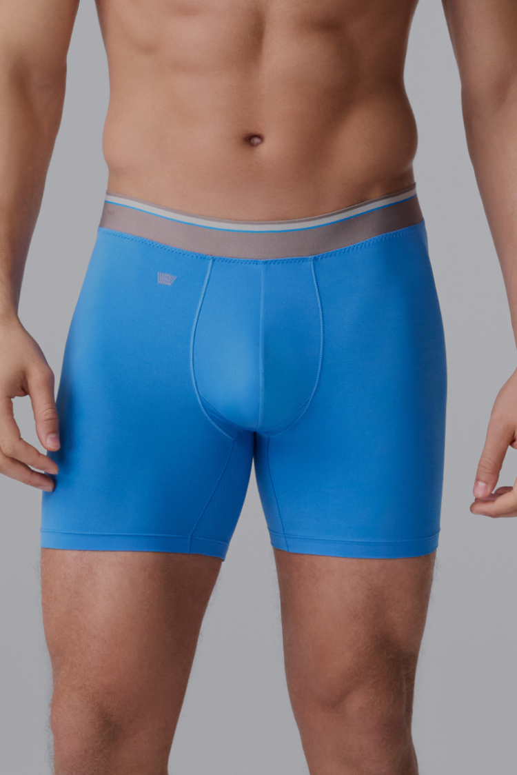front image of man wearing blue Endurance FX boxer briefs