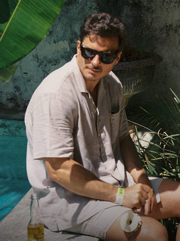 Man wearing Tech Linen Camp Shirt in Latte