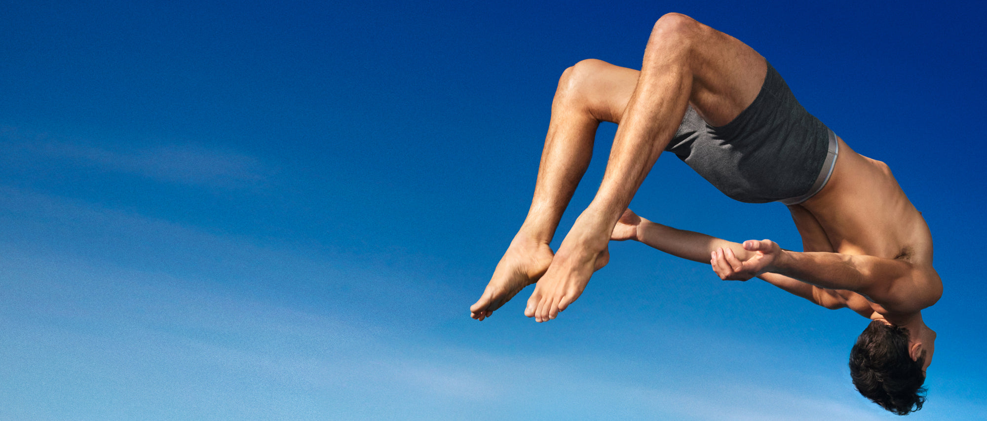 man jumping wearing Mack Weldon Airknitx Boxer brief