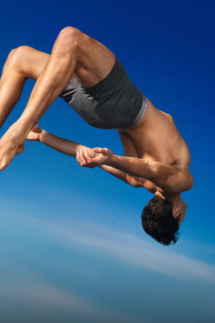 man jumping wearing Mack Weldon Airknitx Boxer brief