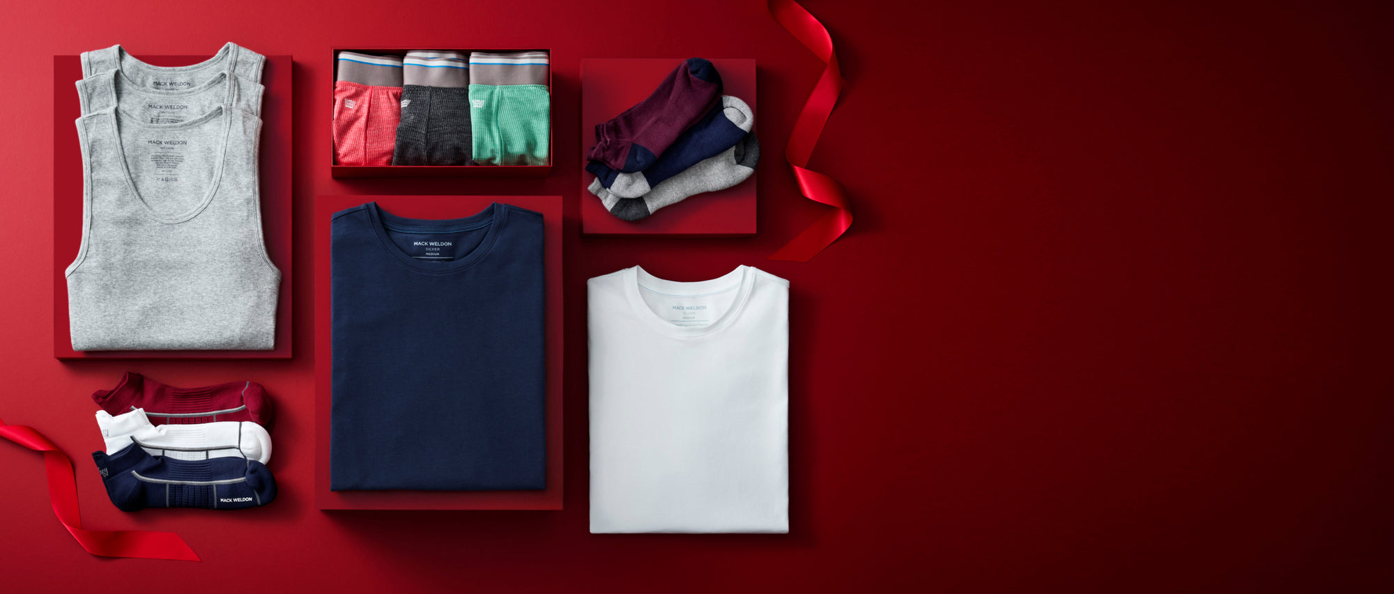 Laydown of Mack Weldon Holiday Gift Shop Products