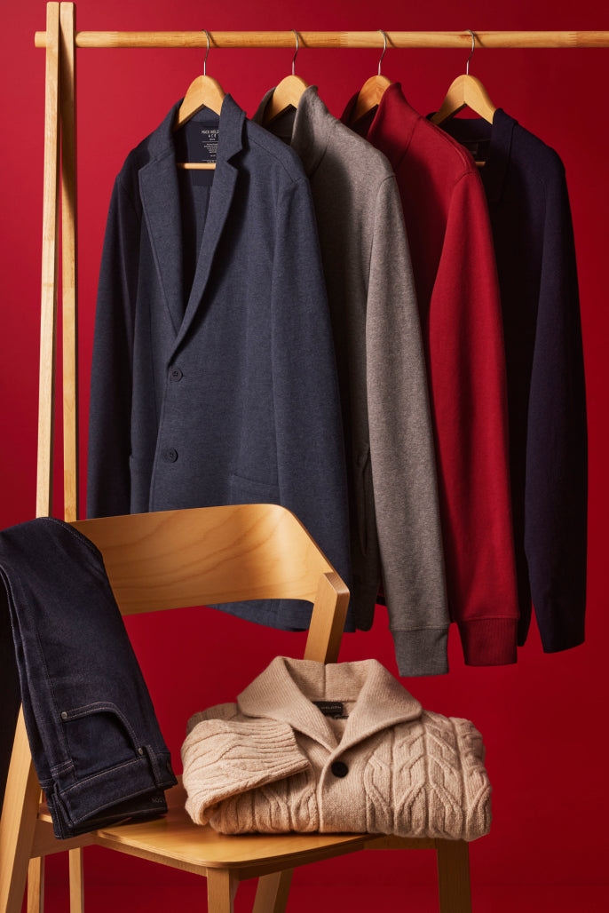 Wooden rack holding Mack weldon apparel.