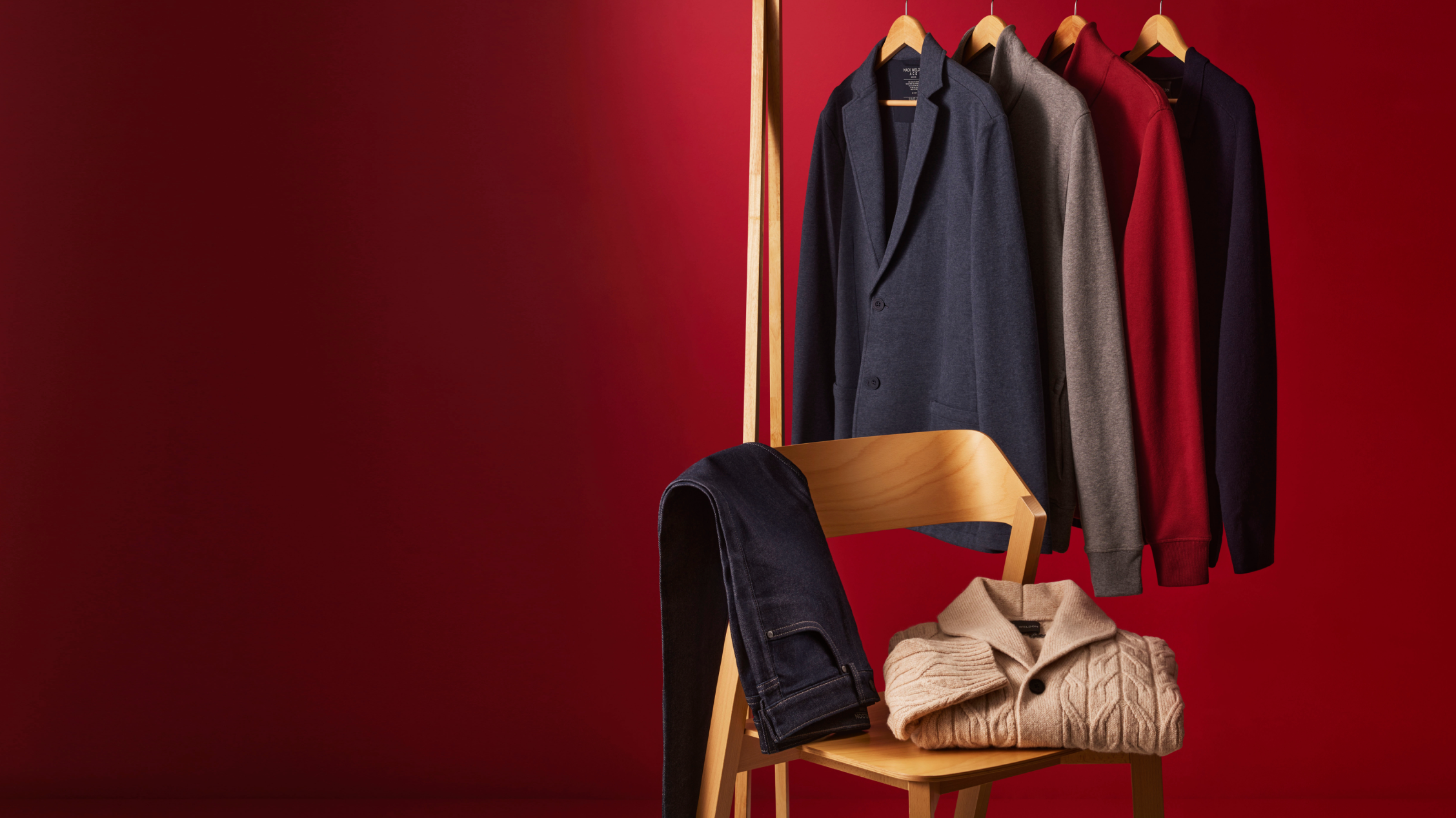 Wooden rack holding Mack weldon apparel.