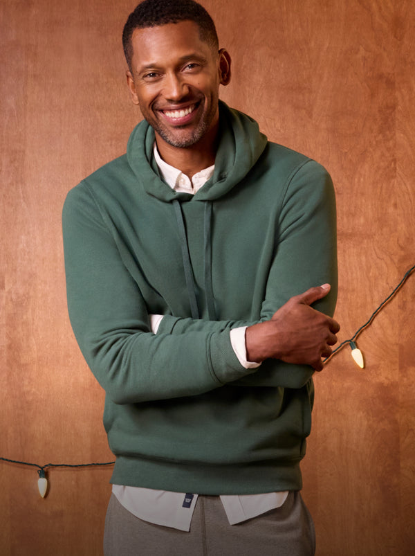 Man wearing ACE Pullover Hooded Sweatshirt