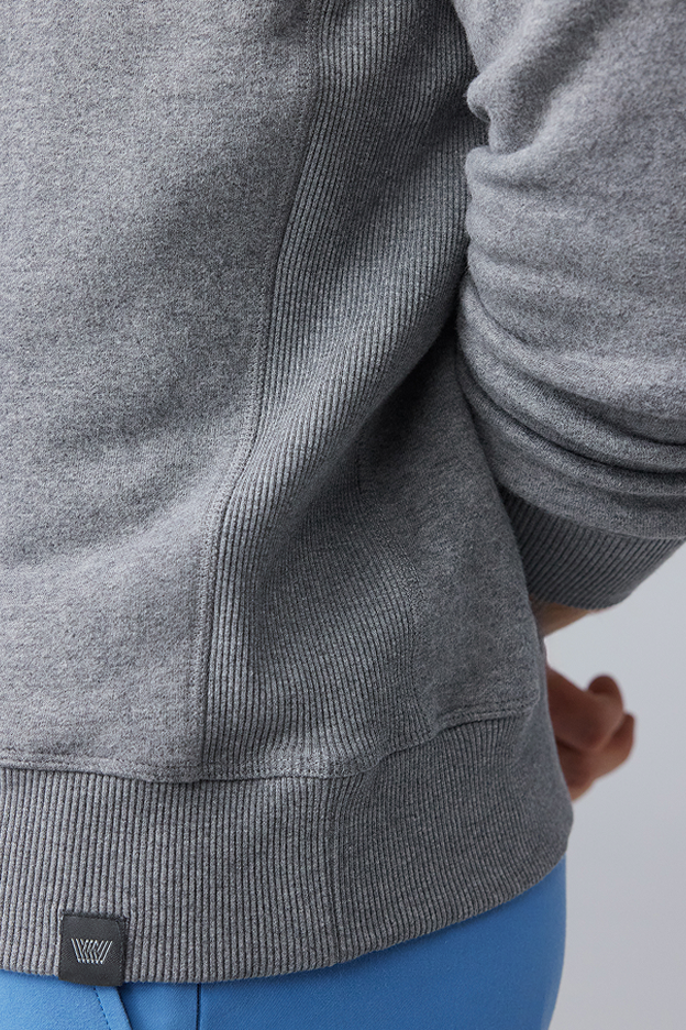 Gray sweatshirt with a brand logo on a white background