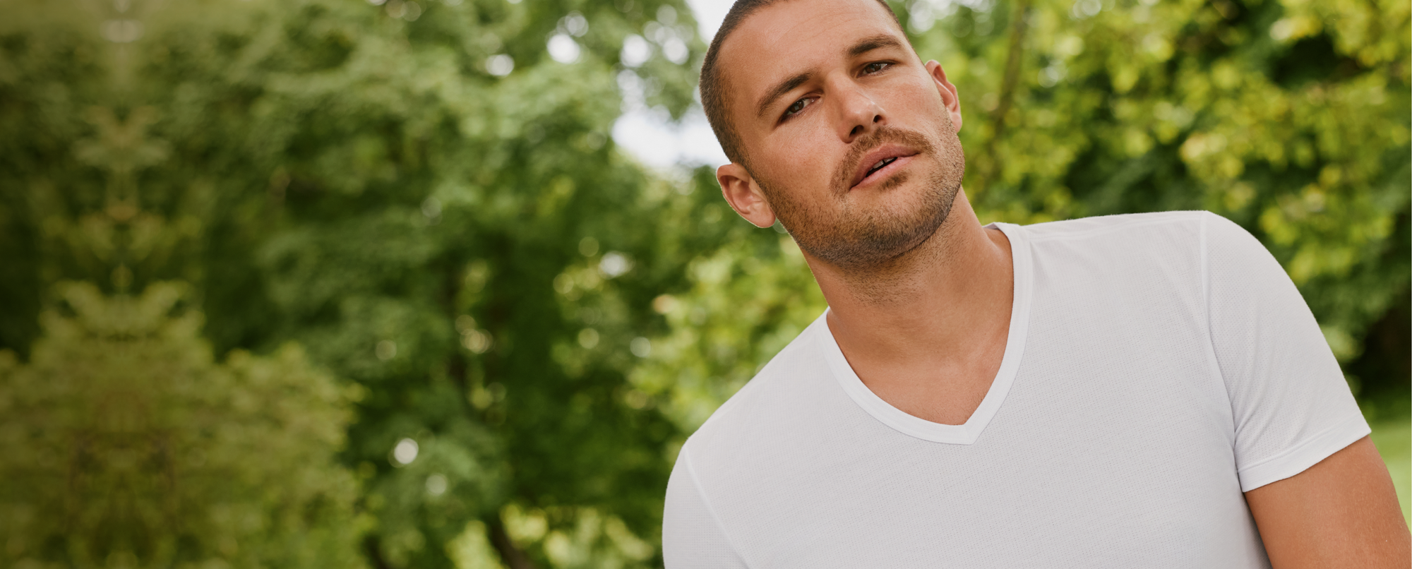 Man wearing Airknitx cotton v-neck Undershirt in Bright White