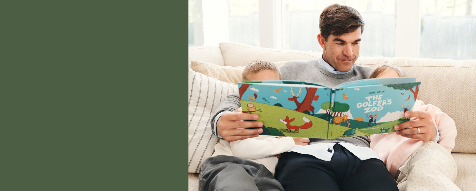 Man with his children reading the Golfer's Zoo book.
