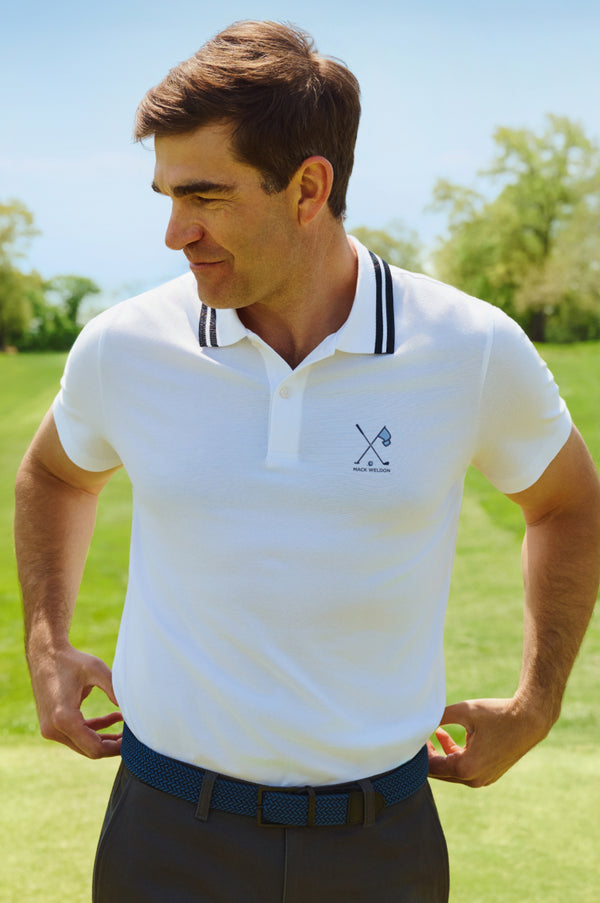 Man wearing Mack Weldon x Shane Bacon Logo Polo