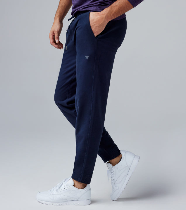 image of man wearing navy blue sweatpants