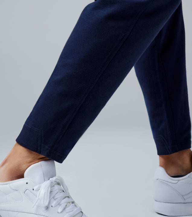 close up of ribbed cuff on the ankle of ACE navy blue sweatpant