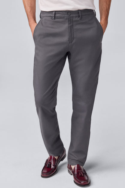 Man wearing Maverick Tech Chino in Asphalt