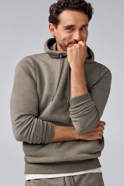 Man wearing Ace Pullover Hooded Sweatshirt in Sage Heather