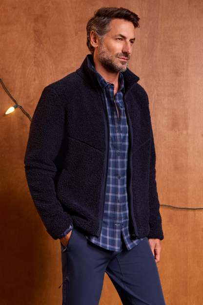 Man wearing WARMKNIT Sherpa Fleece in Total Eclipse